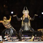 Singer Madonna (C) performs during the N